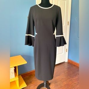 Barely worn CK dress with bell sleeves and waist detail